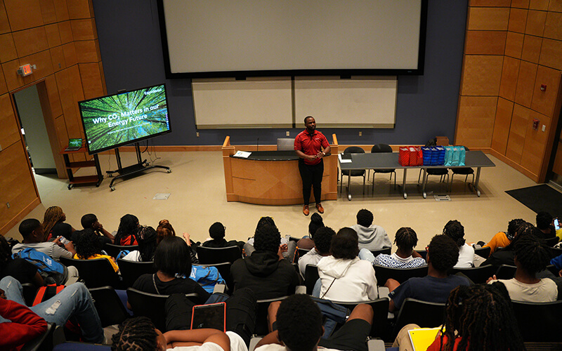 Students listening to presentations