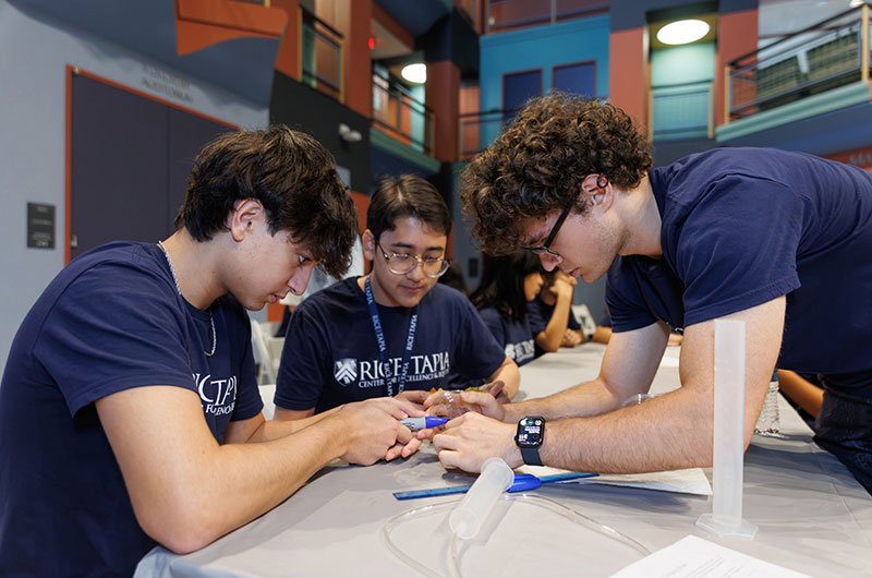 Students building reservoirs