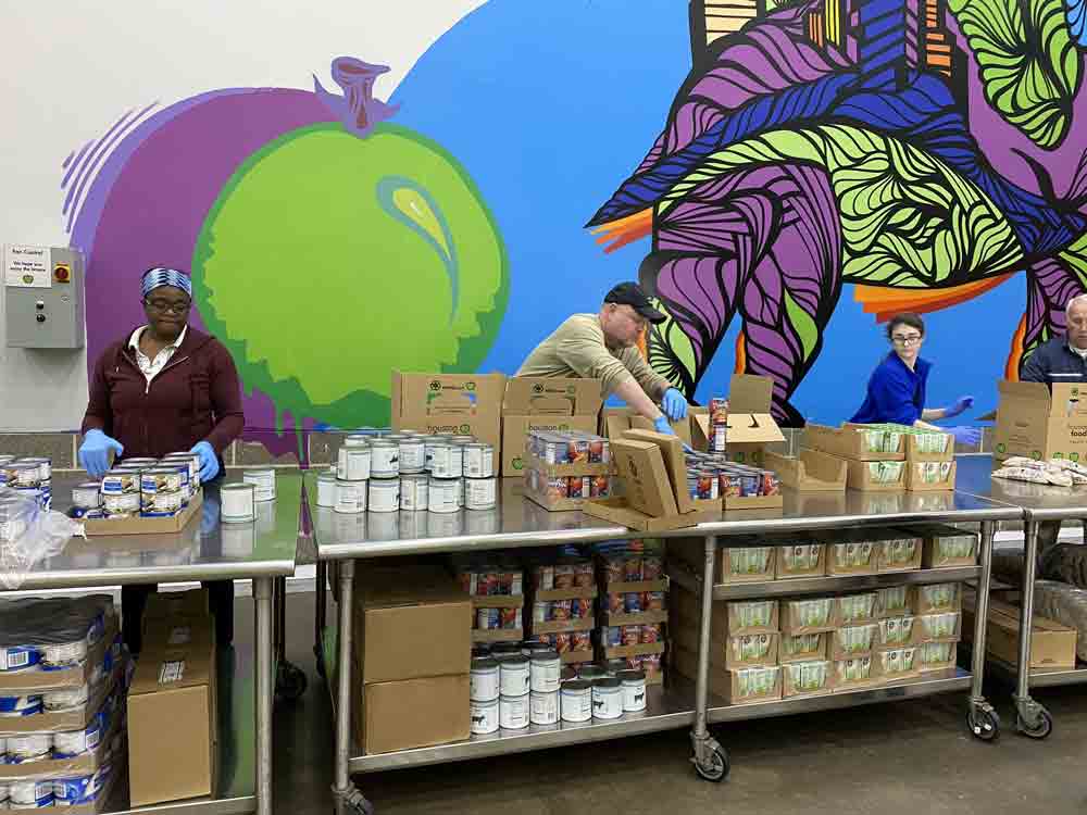 Packing supplies at the Houston Foodbank